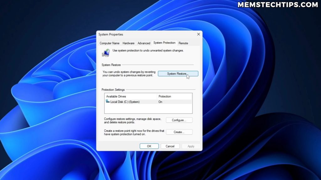 System Properties dialog in Windows showing System Restore button in System Protection tab