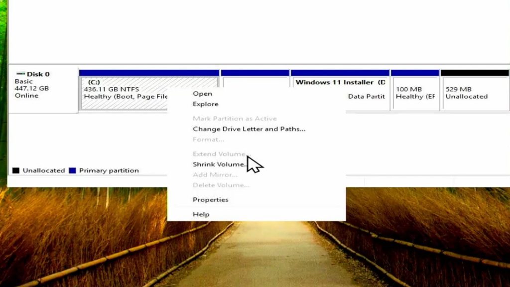 Windows 11 disk management showing greyed out extend volume option with recovery partition blocking C drive extension
