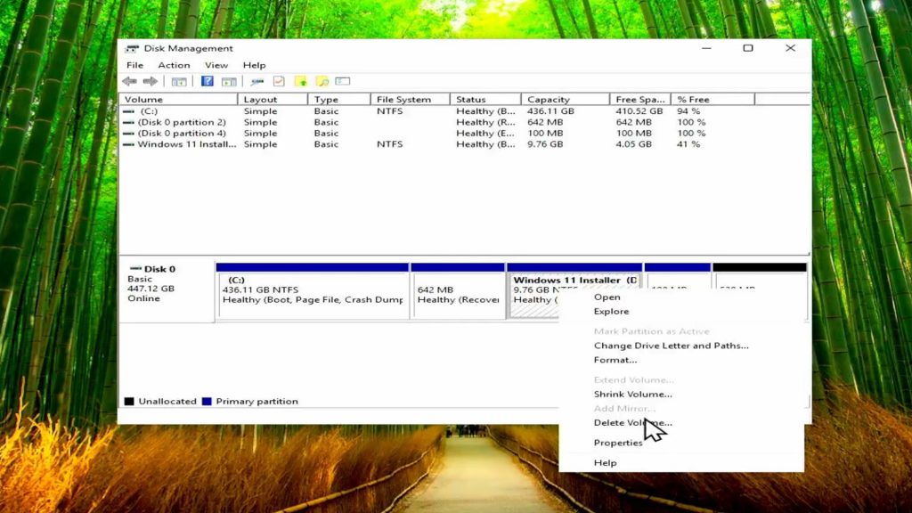 Right-clicking Windows installer partition in disk management to delete volume and free up space